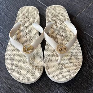 Michael Kors cream & gold flip flops